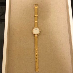Gold KEEP collective watch face and band